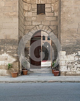 Door of Mamluk era mosque of Ibn Qalauon, revealing the mosqu`s courtyard, Cairo Citadel, Egypt photo