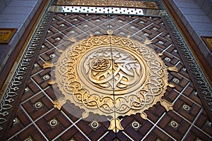 The door of Masjid Nabawi. Arabic Calligraphy: Muhammad Rasulullah