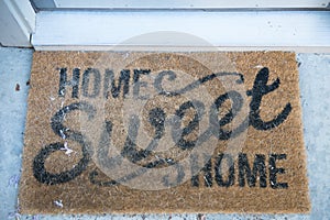 Door Mat with the words: Home Sweet Home.