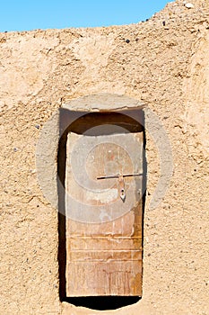 door in morocco ancien and wall ornate brown