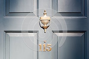 Door number one hundred and fifteen and knocker vignette look photo