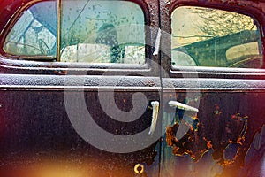 Door old abandoned car