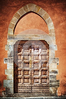 Door in an orange grunge wall