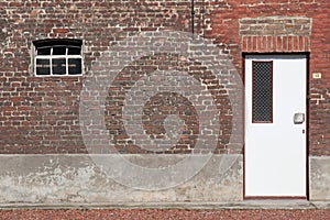 Door in a red brick wall