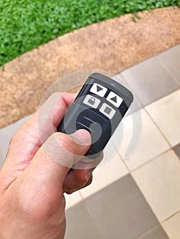 Door Remote Control in hand