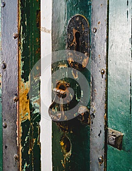 Door with rusty iron knock