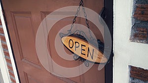 Door of a shop with `OPEN` sign