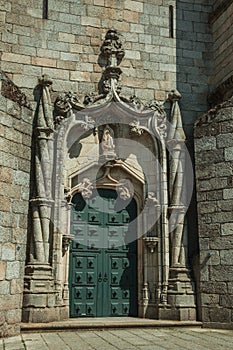 Door and stone decoration spiraling column in a Cathedral