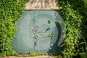 Door and stone wall on the promenade Clair de lune in Dinard