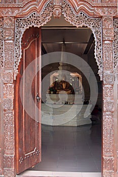The door of the temple in Brahmavihara Arama monastery, Bali Island (Indonesia)