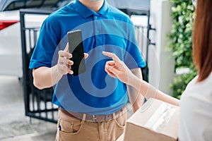 Door to door delivery express sending send a package to customer receiver sign with smartphone checking shipping deliver