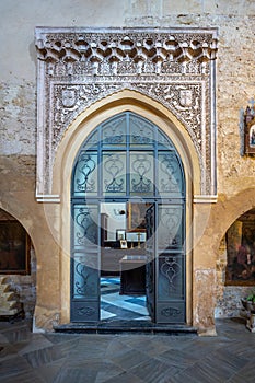 Door to the former Chapel of the Orozco at Santa Marina Church - Route of the Fernandine Churches - Cordoba, Andalusia, Spain