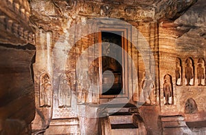 Door to sanctuary of the 7th century cave temple in Karnataka, India. Structure dedicated to the Jain Lord Mahavira.