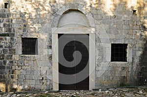 The door in the wall of masonry