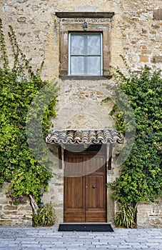 Door and window in the Italian village of Scanno photo