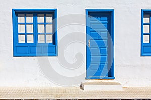 Door and windows painted in blue