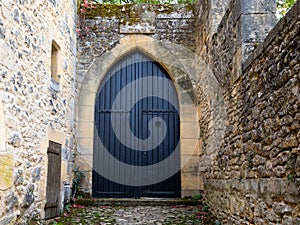 Door wooden blue arch ancient home access of city house street facade vintage city medieaval photo