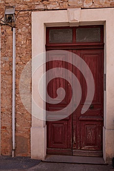 Door wooden brown classic home access of city house street facade