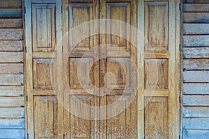 Door wooden pattern textured background, antique place in Thailand.