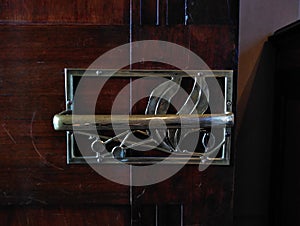 Doorhandle in old mansion. Art nouveau interior details.