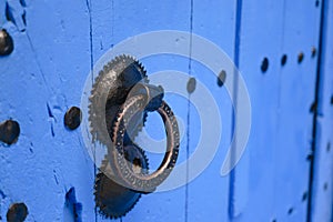 Doorknocker on a blue door, Chefchaouen, Morocco