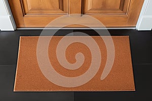 Doormat at entrance Blank brown mat with inviting welcome appeal