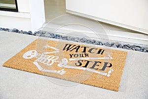 Doormat Outside Open Front Door Of House photo