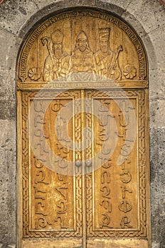 Doors with Armenian alphabet on the entrance to the Church of St. Mesrop Mashtots in Oshakan village
