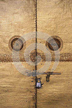 The doors of a buddhist temple in Wangdue Phodrang, Bhutan, were padlocked photo