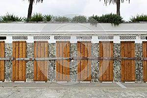 Doors covered and locked with wooden planks