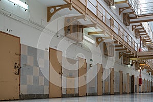 doors of prison cells in the corridor photo
