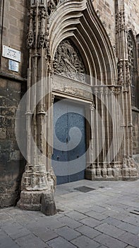 Doors of Saint Ivo at the northern side and former main entrance to Barcelona Cathedral, a gothic cathedral