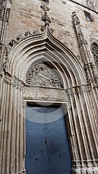 Doors of Saint Ivo at the northern side and former main entrance to Barcelona Cathedral, a gothic cathedral