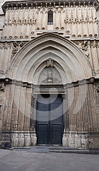Doors of Saint Ivo at the northern side and former main entrance to Barcelona Cathedral, a gothic cathedral