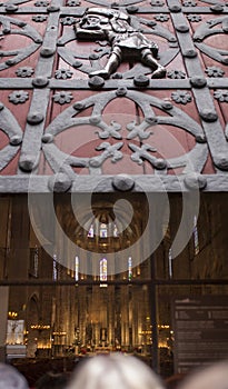 Doors of Santa Maria del Mar main entrance with stone porters or bastaixos