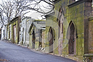 Doors to the crypts on cemetery photo