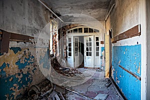 Doorway with beautiful doors in an old abandoned building