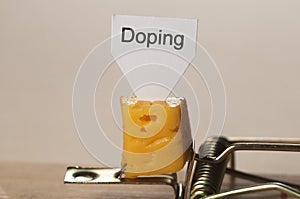 Doping sign on a cheese in mouse trap