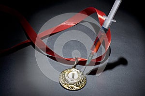 Doping in sport concept. Drugs and medals on black background.