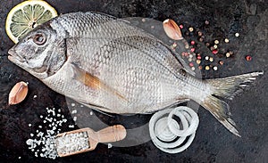 Dorado fish on pan with spices