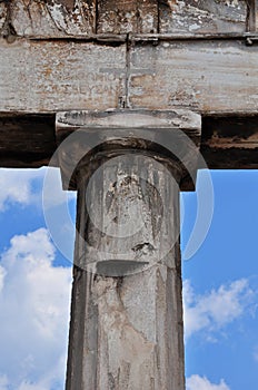 Doric column and faded inscription