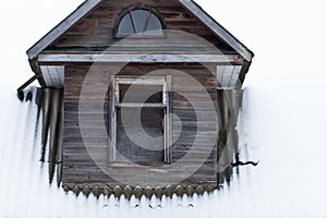 Dormer in an old wooden house