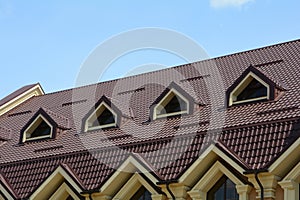 Dormer windows on metal roof. Metal Roofing.