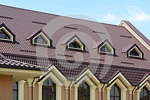 Dormer windows on metal roof. Metal Roofing.