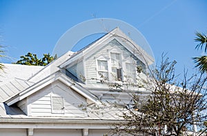 Dormers on Old White Wood Home