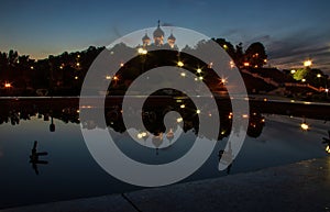 Dormition church. Reflection in the fountains on the Volga embankment. Night scene