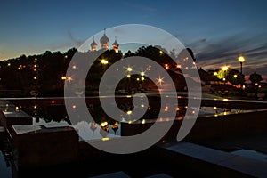 Dormition church. Reflection in the fountains on the Volga embankment. Night scene