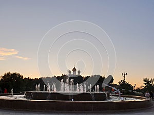 Dormition church. Reflection in the fountains on the Volga embankment. Night scene