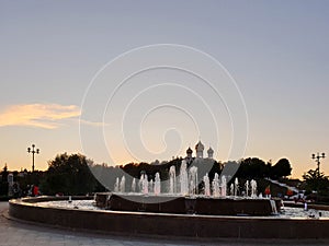 Dormition church. Reflection in the fountains on the Volga embankment. Night scene