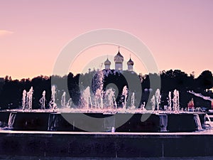 Dormition church. Reflection in the fountains on the Volga embankment. Night scene